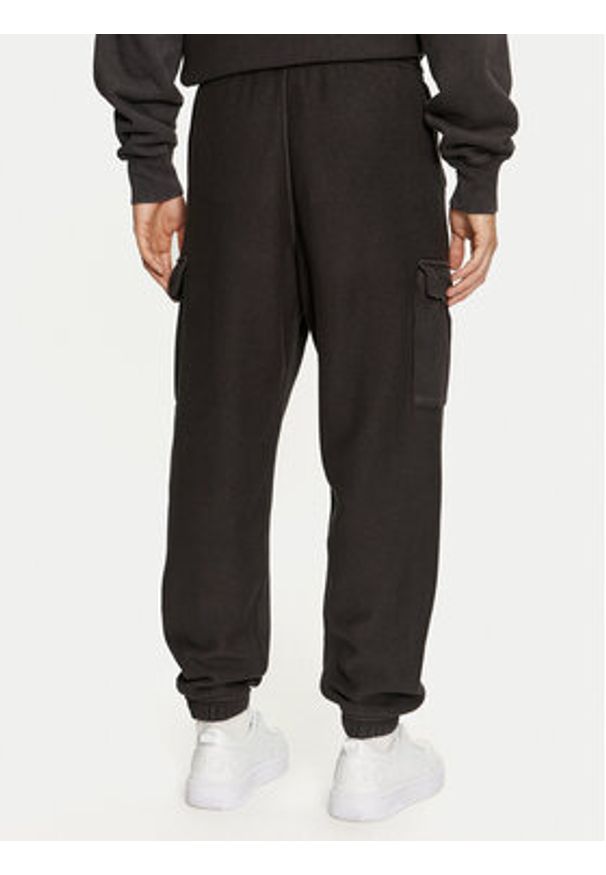 Champion Spodnie dresowe 218645 Czarny Regular Fit. Kolor: czarny. Materiał: bawełna