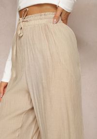 Renee - Beżowe Wiskozowe Spodnie Szerokie z Gumką i Sznurkiem w Pasie Tarallia. Okazja: na co dzień. Kolor: beżowy. Materiał: wiskoza. Styl: elegancki, casual