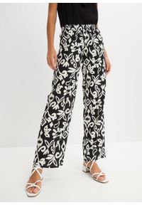 bonprix - Spodnie Marlena z nadrukiem, z lejącej wiskozy. Kolor: czarny. Materiał: wiskoza. Wzór: nadruk #1