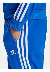 Adidas - adidas Spodnie dresowe adicolor SST IY4007 Niebieski Regular Fit. Kolor: niebieski. Materiał: syntetyk #5