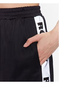 ROTATE Spodnie dresowe Long Straight 700299100 Czarny Straight Leg. Kolor: czarny. Materiał: syntetyk #4