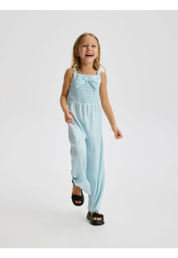 Reserved - Strukturalny kombinezon - jasnoturkusowy. Kolor: turkusowy. Materiał: dzianina