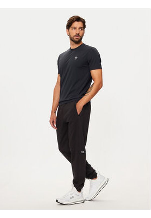 EA7 Emporio Armani Spodnie dresowe 6DPP58 PJVTZ 1200 Czarny Regular Fit. Kolor: czarny. Materiał: bawełna