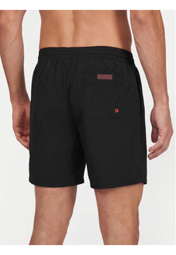 Guess Szorty kąpielowe F6GT24 WG282 MEDIUM Czarny Regular Fit. Kolor: czarny. Materiał: syntetyk