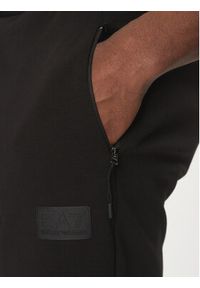 EA7 Emporio Armani Spodnie dresowe 7M000097 AF12116 UC001 Czarny Regular Fit. Kolor: czarny. Materiał: bawełna #3