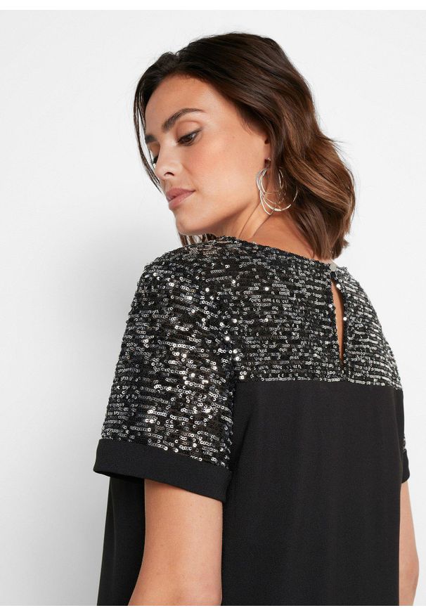 bonprix - Sukienka z wstawką z cekinami. Kolor: czarny