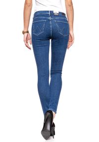 Wrangler - WRANGLER HIGH RISE SKINNY BLUE NOISE W27HFS047. Stan: podwyższony. Wzór: jednolity, aplikacja #8