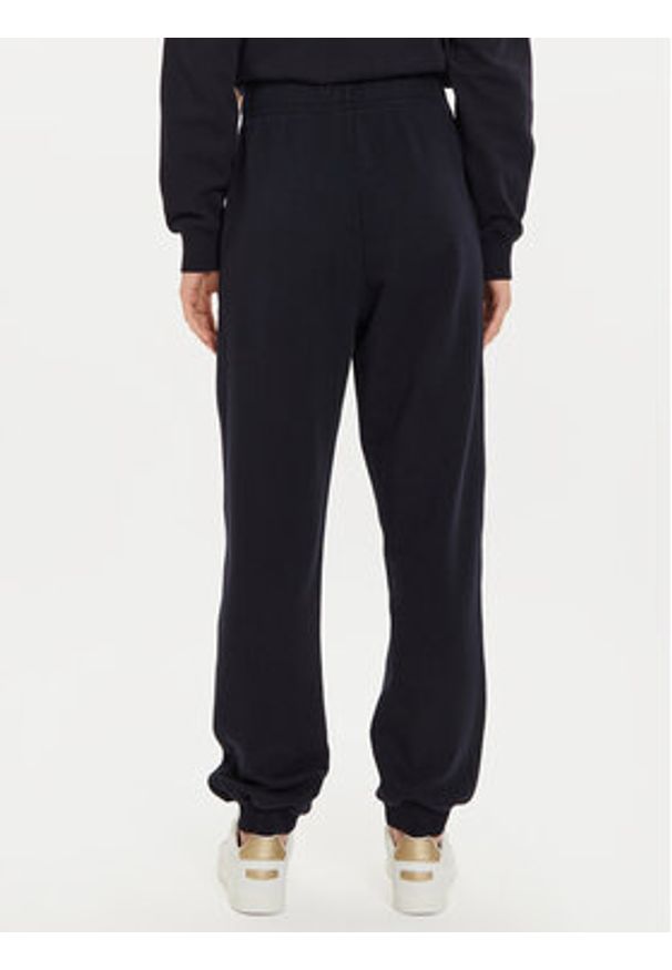 TOMMY HILFIGER - Tommy Hilfiger Spodnie dresowe WW0WW42883 Granatowy Regular Fit. Kolor: niebieski. Materiał: bawełna