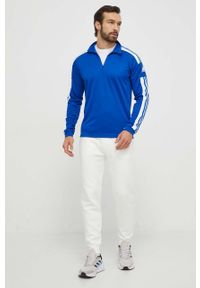 Guess spodnie dresowe kolor biały melanżowe. Kolor: biały. Materiał: dresówka. Wzór: melanż #2