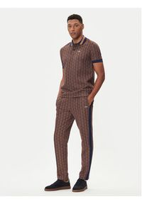 Lacoste Spodnie dresowe XH1440 Brązowy Regular Fit. Kolor: brązowy. Materiał: syntetyk #9