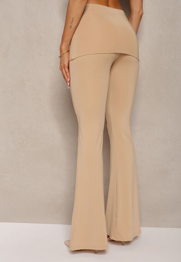 Renee - Beżowe Elastyczne Spodnie o Kroju Dzwonów High Waist z Modelującego Materiału Ivolea. Stan: podwyższony. Kolor: beżowy. Materiał: materiał
