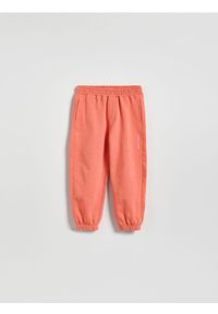 Reserved - Bawełniane spodnie jogger - czerwony. Kolor: czerwony. Materiał: bawełna