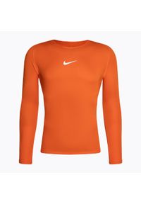 Longsleeve termoaktywny męski Nike Dri-FIT Park First Layer LS. Kolor: pomarańczowy. Długość rękawa: długi rękaw. Technologia: Dri-Fit (Nike)