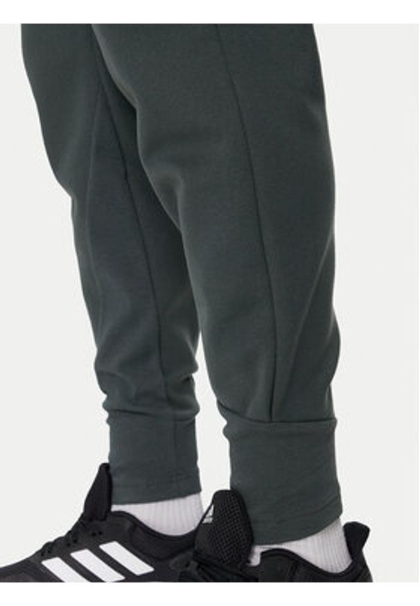 Adidas - adidas Spodnie dresowe Z.N.E. Winterized IR5244 Zielony Regular Fit. Kolor: zielony. Materiał: syntetyk