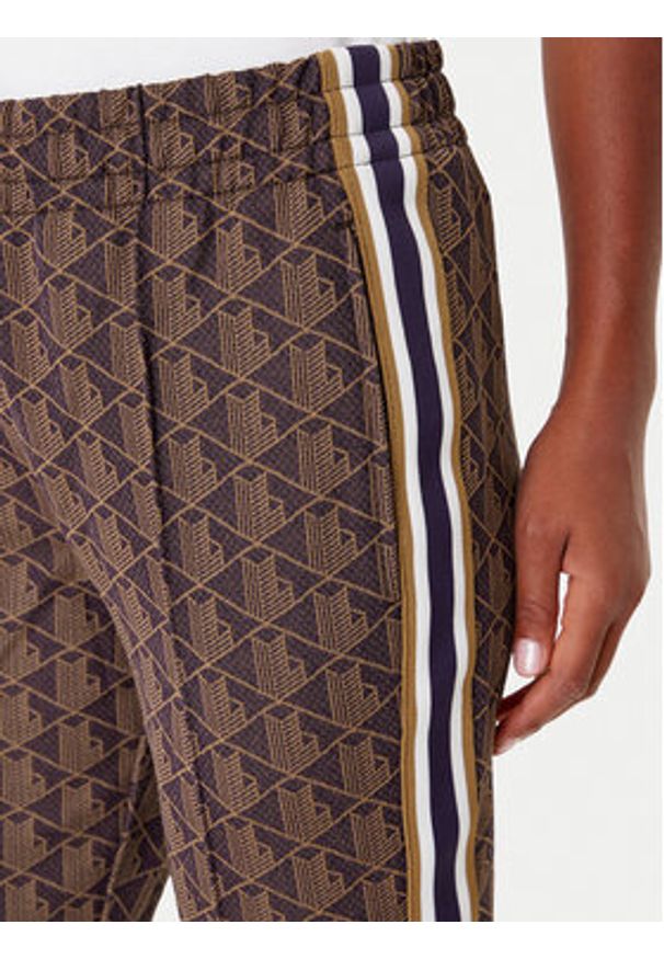 Lacoste Spodnie dresowe XF9313 Brązowy Regular Fit. Kolor: brązowy. Materiał: syntetyk