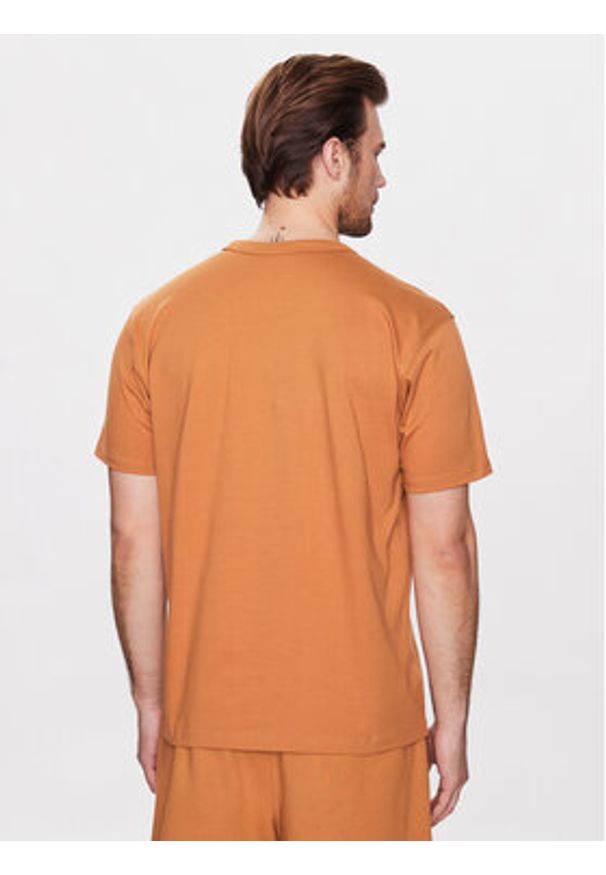New Balance T-Shirt Athletics Nature State MT23567 Pomarańczowy Relaxed Fit. Kolor: pomarańczowy. Materiał: bawełna