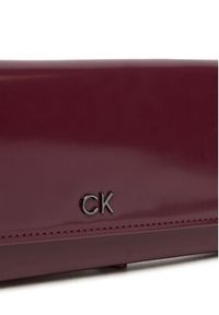 Calvin Klein Torebka Ck Daily Lg Trifold K60K612423 Bordowy. Kolor: czerwony. Materiał: skórzane