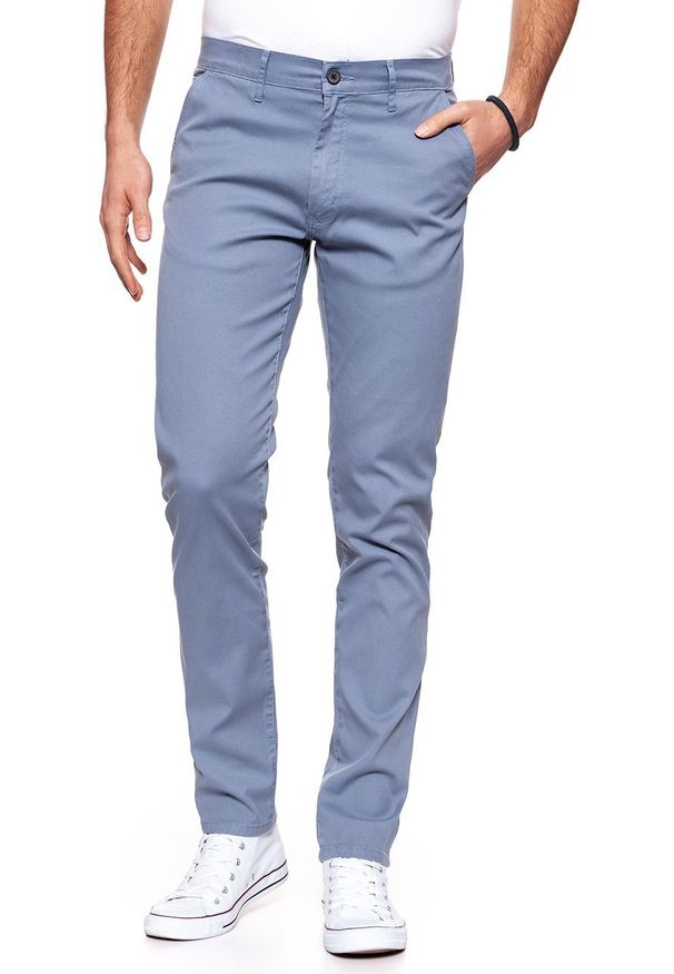 Wrangler - WRANGLER SPODNIE MĘSKIE CHINO FLINSTONE BLUE W16LHE13F. Materiał: materiał