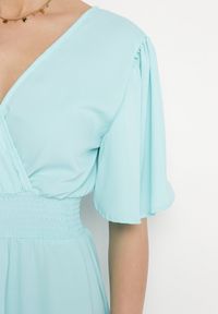 Born2be - Jasnoniebieska Sukienka z Rozkloszowanymi Rękawami Gumką w Pasie i Wiązaniem na Plecach Larielle. Okazja: na imprezę, na co dzień. Typ kołnierza: dekolt w kształcie V. Kolor: niebieski. Materiał: bawełna. Typ sukienki: proste. Styl: elegancki, casual #2