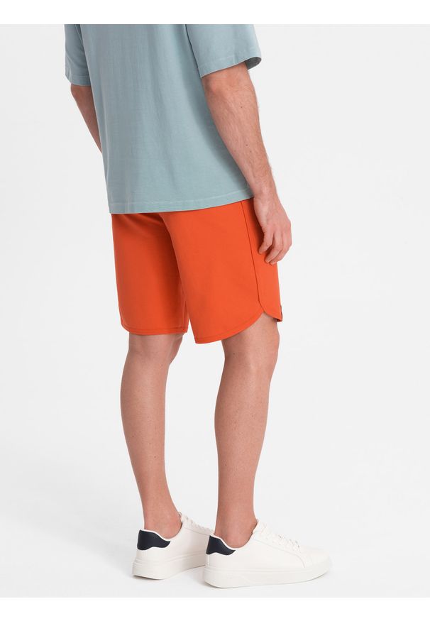 Ombre Clothing - Męskie szorty dresowe z zaokrągloną nogawką - pomarańczowe V5 OM-SRSK-0105 - XL. Kolor: pomarańczowy. Materiał: dresówka. Wzór: ze splotem. Styl: sportowy