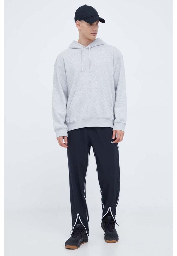 Calvin Klein Performance spodnie treningowe kolor czarny z aplikacją. Kolor: czarny. Materiał: materiał. Wzór: aplikacja