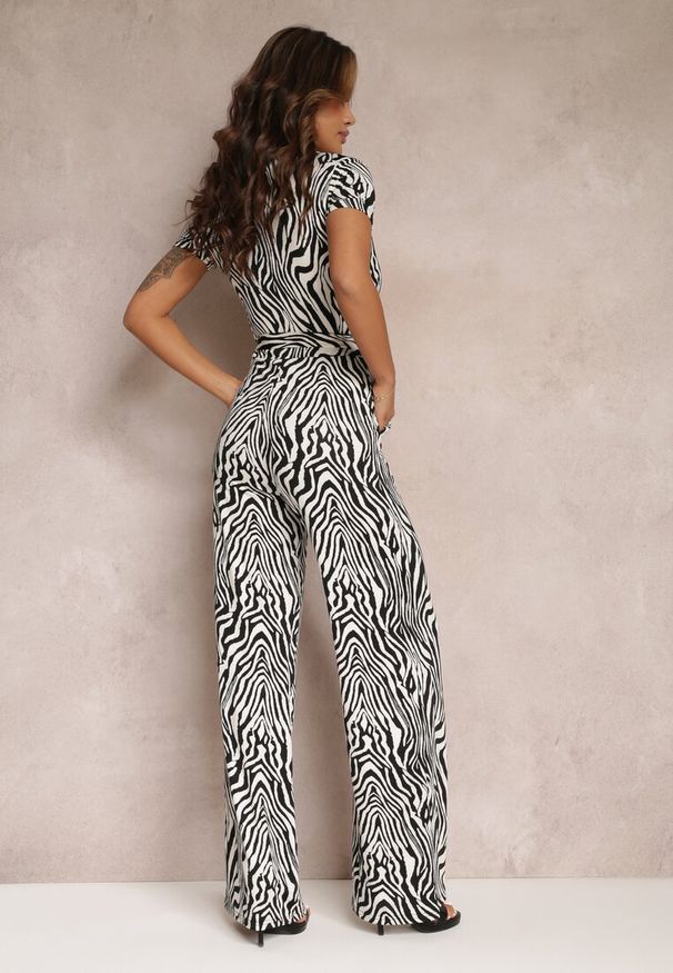 Renee - Biało-Czarny Długi Kombinezon z Wiązaniem i Zwierzęcym Wzorem Marlifia. Kolor: biały. Długość: długie. Wzór: motyw zwierzęcy. Sezon: wiosna, lato