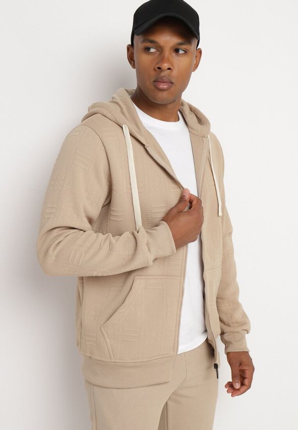 Born2be - Ciemnobeżowa Rozpinana Bluza z Bawełną i Kapturem i Ozdobnymi Sznurkami Bialise. Okazja: na co dzień. Kolor: beżowy. Materiał: bawełna. Długość rękawa: długi rękaw. Długość: długie. Styl: casual, elegancki, klasyczny