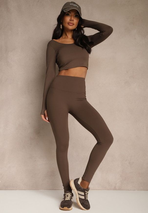 Renee - Brązowe Legginsy High Waist Ozdobione Przeszyciem Belanessa. Okazja: na co dzień. Stan: podwyższony. Kolor: brązowy. Wzór: aplikacja. Styl: casual