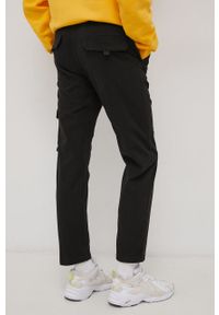 Tommy Jeans Spodnie męskie kolor czarny proste. Okazja: na co dzień. Kolor: czarny. Materiał: bawełna, materiał, tkanina. Wzór: gładki. Styl: casual