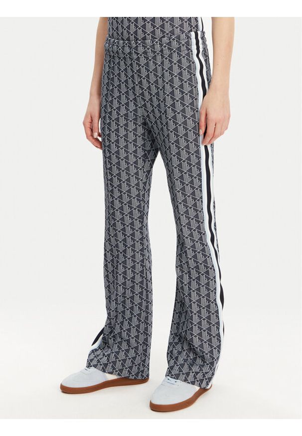 Lacoste Spodnie dresowe XF9313 Granatowy Regular Fit. Kolor: niebieski. Materiał: syntetyk, bawełna