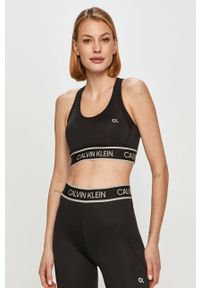 Calvin Klein Performance - Biustonosz sportowy. Kolor: czarny. Materiał: poliester, materiał, elastan. Rodzaj stanika: odpinane ramiączka. Wzór: nadruk #2