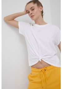 DKNY - Dkny t-shirt bawełniany kolor biały. Kolor: biały. Materiał: bawełna. Wzór: aplikacja