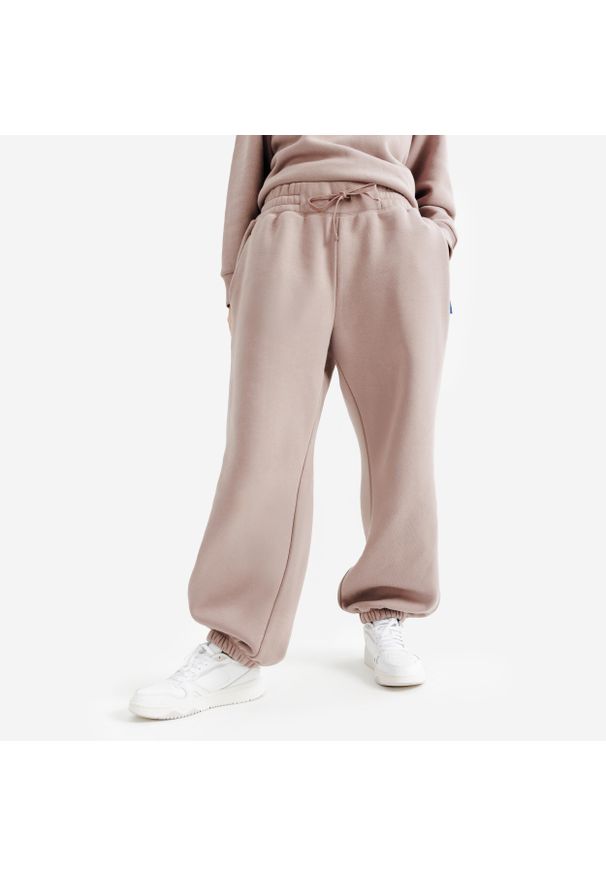 Decathlon - Spodnie damskie Elementals. Kolor: różowy, brązowy, wielokolorowy. Materiał: poliester, bawełna, materiał