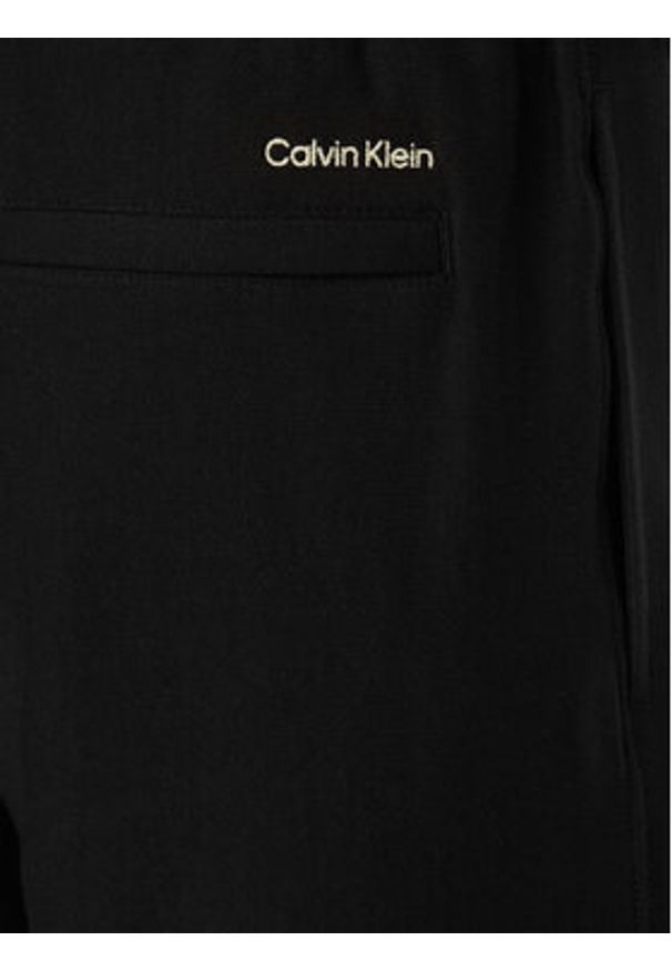 Calvin Klein Jeans Spodnie dresowe LV04RF249G Czarny Regular Fit. Kolor: czarny. Materiał: bawełna