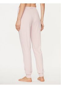 Guess Spodnie dresowe O3BB00 KBXB2 Różowy Regular Fit. Kolor: różowy. Materiał: syntetyk