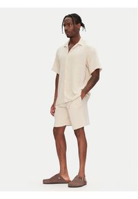 Jack & Jones - Jack&Jones Komplet koszula i szorty materiałowe Easter 12281255 Beżowy Relaxed Fit. Kolor: beżowy. Materiał: bawełna