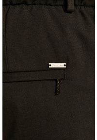 Calvin Klein - Spodnie. Kolor: czarny. Materiał: wełna, bawełna, materiał, elastan, tkanina, poliester. Wzór: gładki #2
