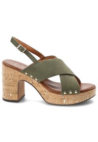 Sandały damskie Marco Tozzi, na wysokim słupku z krzyżowanymi paskami i regulowanym zapięciem przy pięcie osadzone na platformie o korkowym wykończen. Zapięcie: pasek. Kolor: zielony. Materiał: len. Wzór: paski. Sezon: lato. Obcas: na platformie. Styl: elegancki, klasyczny. Wysokość obcasa: średni #7