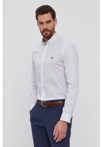 Polo Ralph Lauren Koszula bawełniana męska kolor biały slim z kołnierzykiem button-down. Typ kołnierza: button down, polo. Kolor: biały. Materiał: bawełna. Długość rękawa: długi rękaw. Długość: długie. Wzór: aplikacja #4