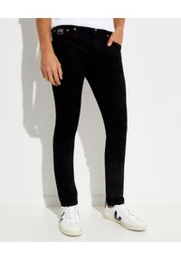 Versace Jeans Couture - VERSACE JEANS COUTURE - Czarne spodnie Slim fit ze złotym logo. Kolor: czarny