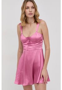 For Love & Lemons Sukienka kolor różowy mini rozkloszowana. Kolor: różowy. Materiał: poliester, tkanina. Długość rękawa: na ramiączkach. Wzór: gładki. Długość: mini