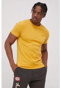 Superdry T-shirt bawełniany kolor żółty gładki. Okazja: na co dzień. Kolor: żółty. Materiał: bawełna. Wzór: gładki. Styl: casual #3