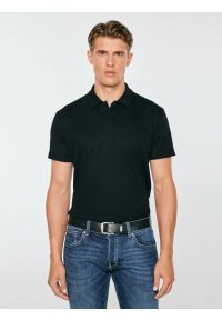 Big-Star - koszulka męska polo czarna nisser 906. Typ kołnierza: polo. Kolor: czarny. Materiał: bawełna, materiał, jeans, dzianina. Wzór: aplikacja. Styl: klasyczny #1