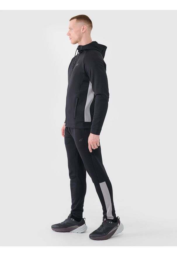 4f - 4F Spodnie treningowe szybkoschnące męskie - czarne L. Kolor: czarny. Materiał: materiał, syntetyk, dresówka, dzianina, włókno, elastan. Wzór: ze splotem, jednolity. Sport: fitness