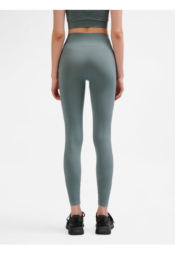 Legginsy sportowe dla kobiet Hummel. Stan: podwyższony. Kolor: wielokolorowy, szary, zielony. Materiał: poliamid. Sport: fitness