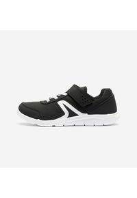 Decathlon - Buty sportowe dla dzieci Newfeel PW 100. Zapięcie: rzepy. Kolor: biały, wielokolorowy, czarny. Materiał: kauczuk. Szerokość cholewki: normalna