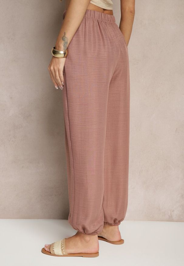 Renee - Brązowe Spodnie Joggery High Waist ze Ściągaczami Korilanea. Okazja: na co dzień. Stan: podwyższony. Kolor: brązowy. Styl: casual, elegancki