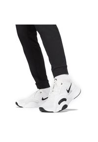 Spodnie treningowe męskie Nike Dri-Fit CZ6379. Materiał: materiał, włókno, dzianina, skóra, bawełna, syntetyk, poliester. Technologia: Dri-Fit (Nike). Sport: fitness #3