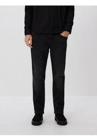 Reserved - Jeansy slim z efektem sprania - czarny. Kolor: czarny