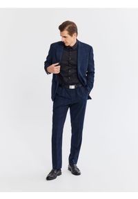 Reserved - Garniturowe spodnie slim fit - granatowy. Kolor: niebieski. Materiał: wiskoza, tkanina #1